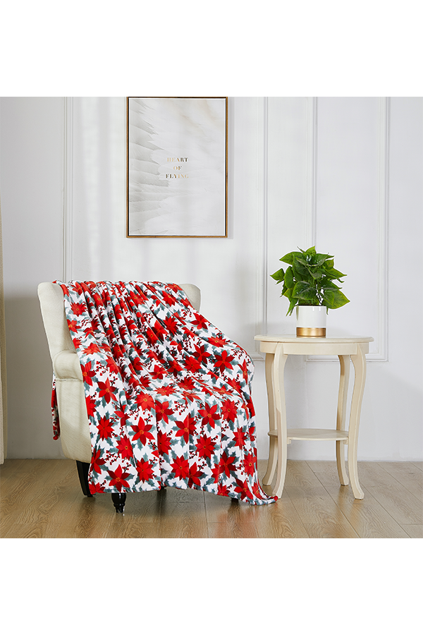 x Christmas Poinsettia Throw $. lifestyle shot